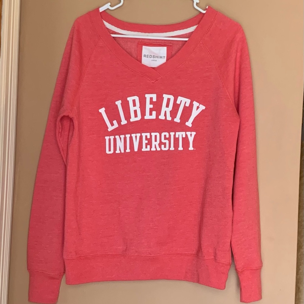 Liberty Uncle varsity size youth large. Red and white long sleeve sweatshirt